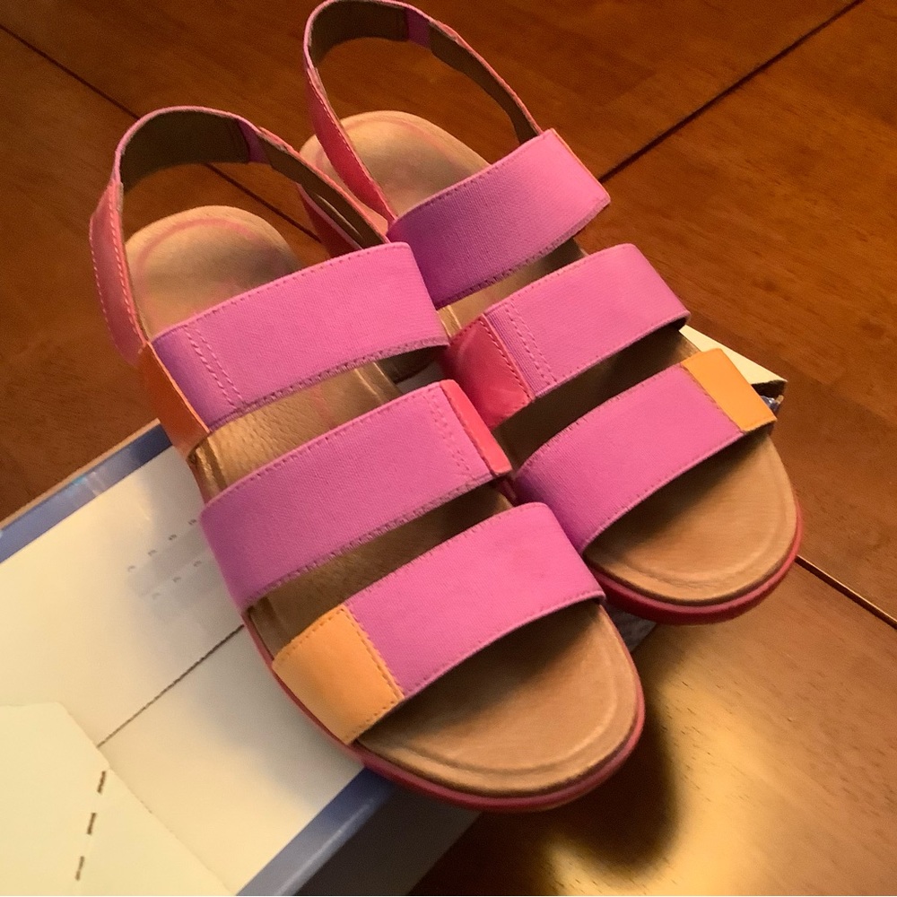 Cute open toe Dansko sandals with small wedge heel